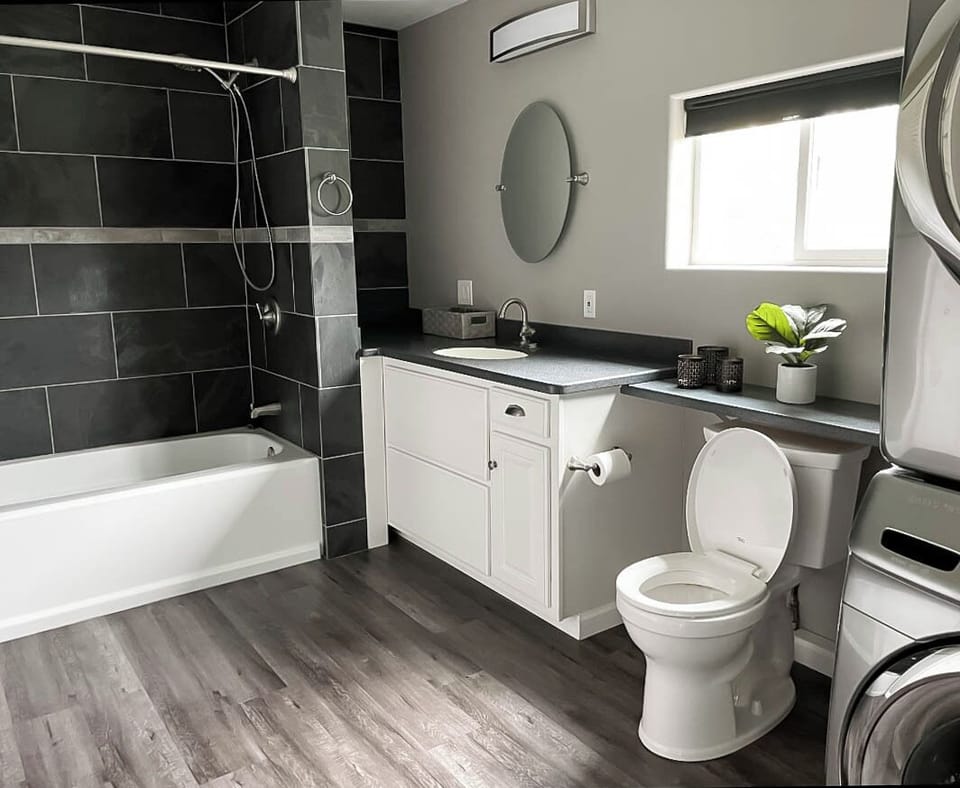 Luxury Duplex, 2 Bedrooms | Bathroom | Combined shower/tub, rainfall showerhead, hair dryer, towels