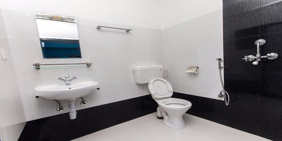 Shower, rainfall showerhead, towels, soap
