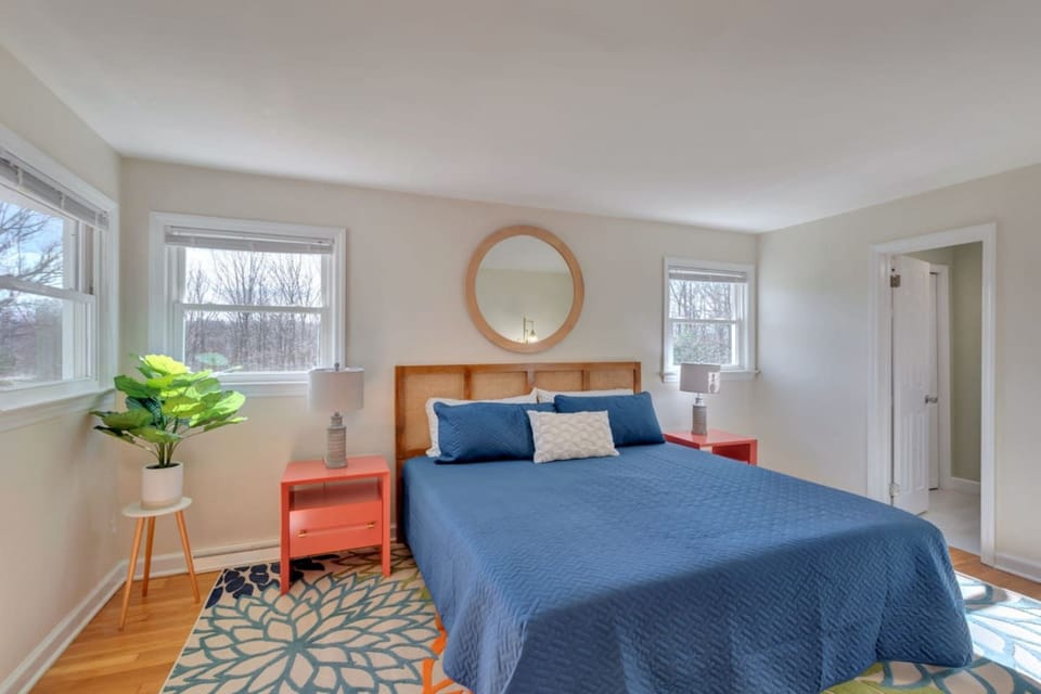 Primary bedroom is comfortably designed with an ensuite bath