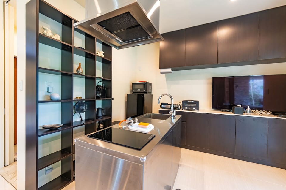 Villa | Private kitchen | Coffee/tea maker, full-size fridge, microwave, oven