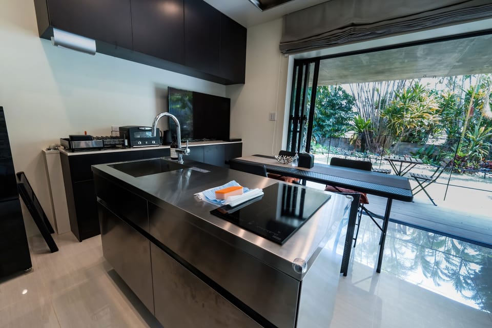 Villa | Private kitchen | Coffee/tea maker, full-size fridge, microwave, oven