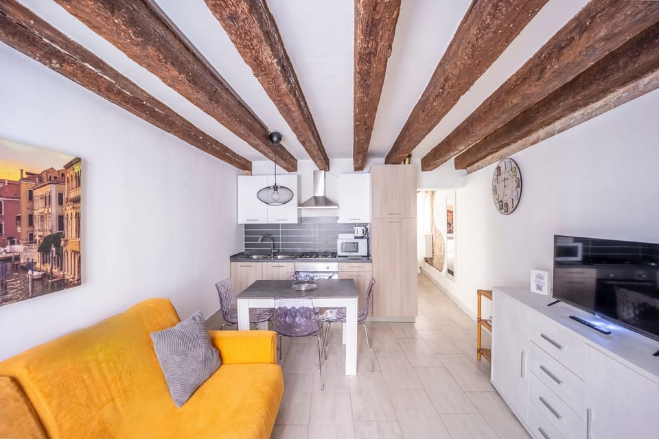 Design Apartment | Private kitchen | Full-size fridge, microwave, oven, stovetop