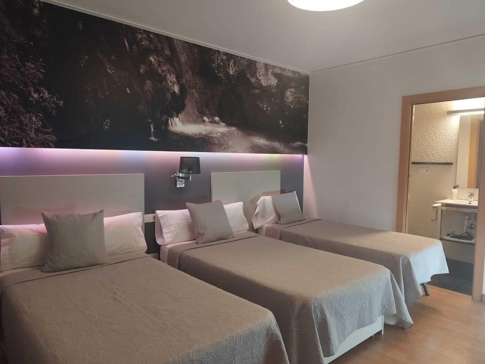 Triple Room | Premium bedding, individually decorated, blackout drapes, free WiFi