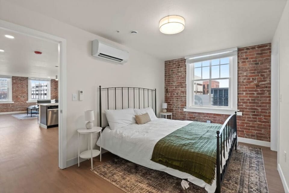 Soft linens and timeless design for a boutique-hotel feel.