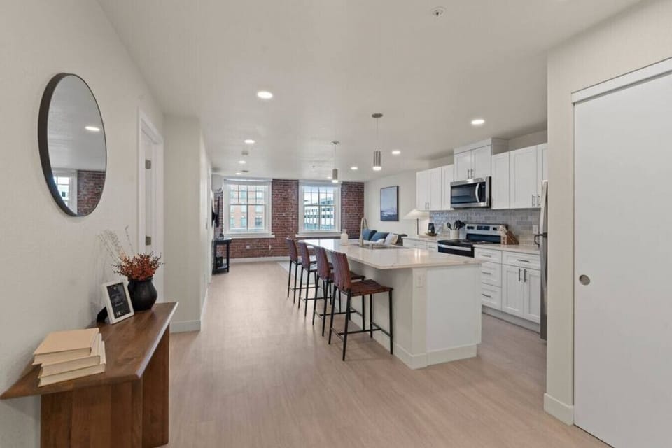 Open-concept design with quartz countertops and hand-picked finishes.