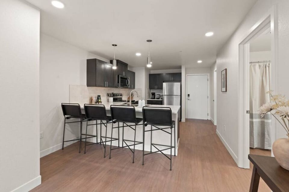 Open-concept design with quartz countertops and hand-picked finishes.