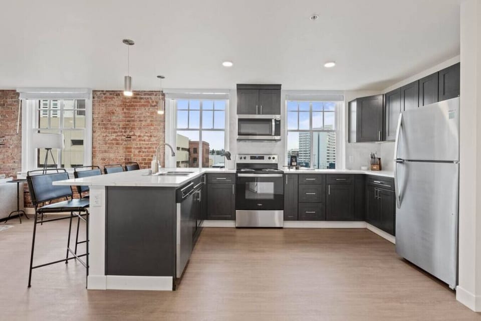 Open-concept design with quartz countertops and hand-picked finishes.