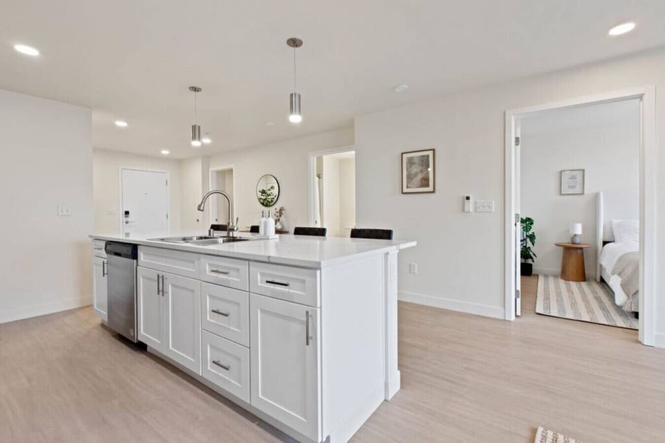 Bright, airy kitchen with plenty of counter space.