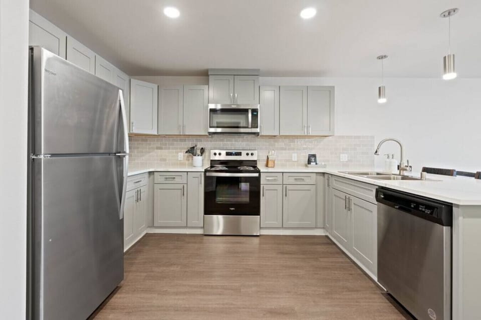 Open-concept design with quartz countertops and hand-picked finishes.