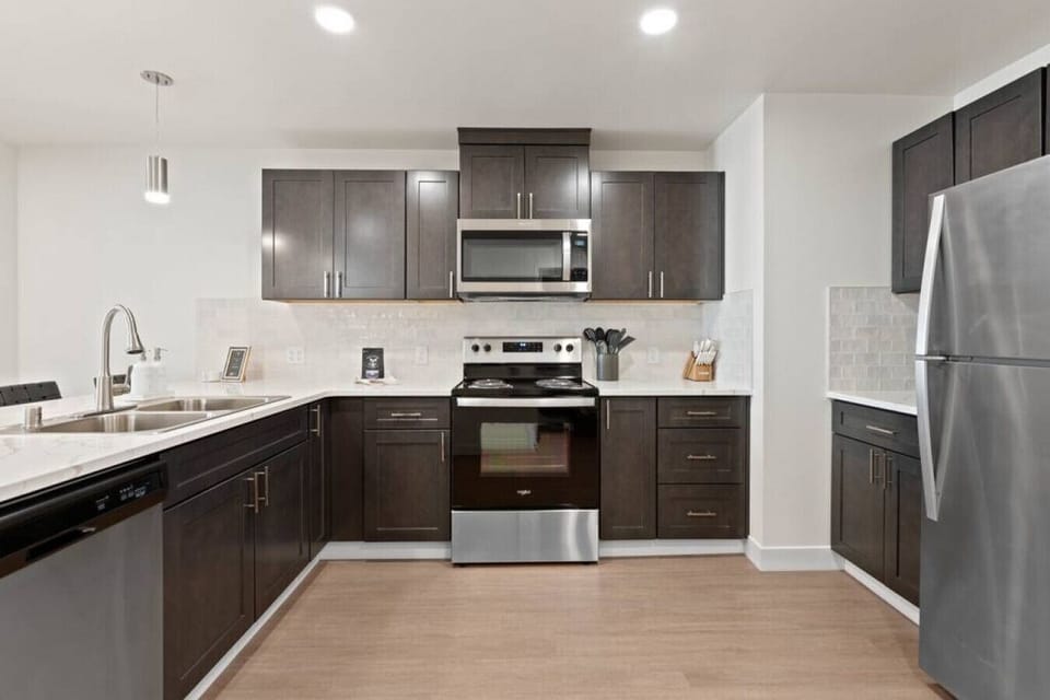 Open-concept design with quartz countertops and hand-picked finishes.