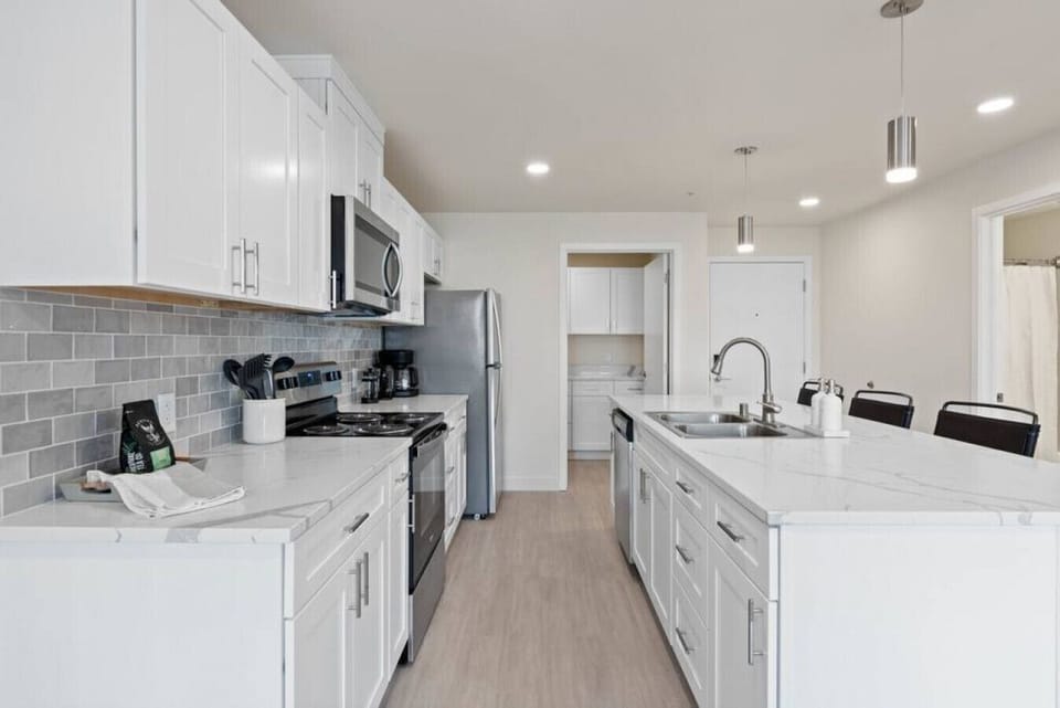 Bright, airy kitchen with plenty of counter space.