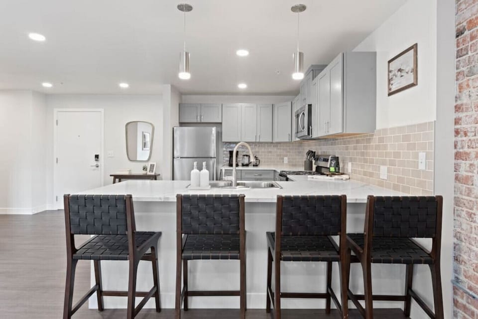 Open-concept design with quartz countertops and hand-picked finishes.