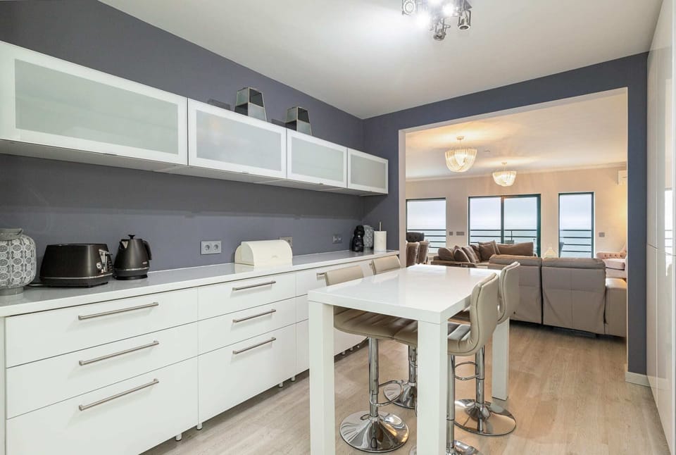 open plan kitchen with sea views
