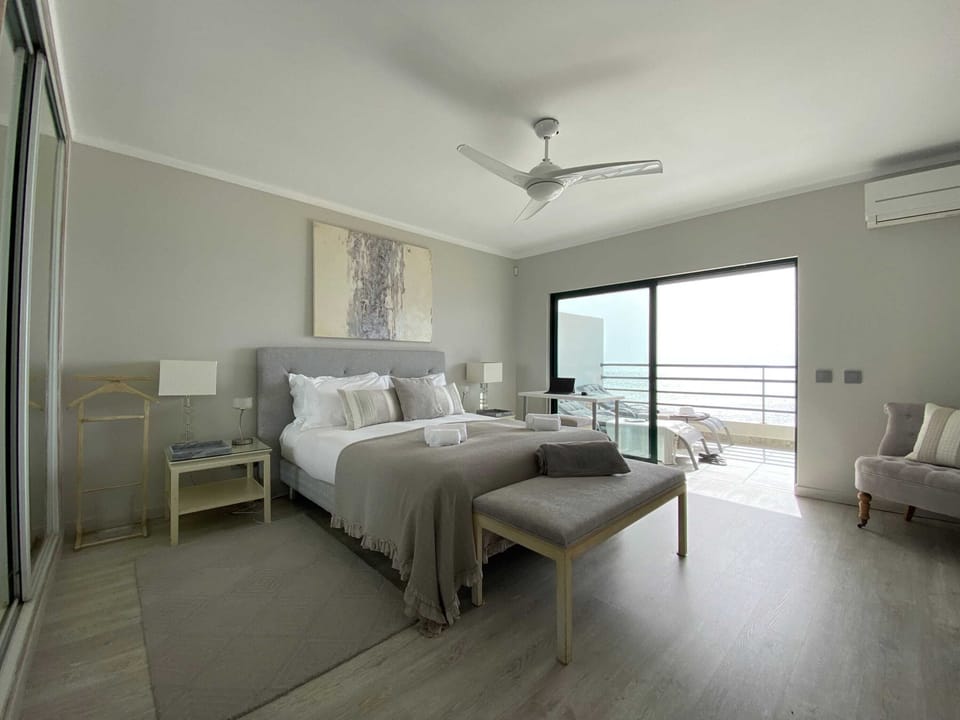 master bedroom on suite with direct balcony access