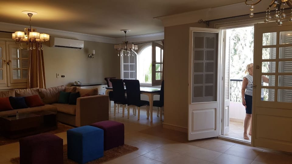 65 m large Lounge and 65"  TV with cupboard on the right