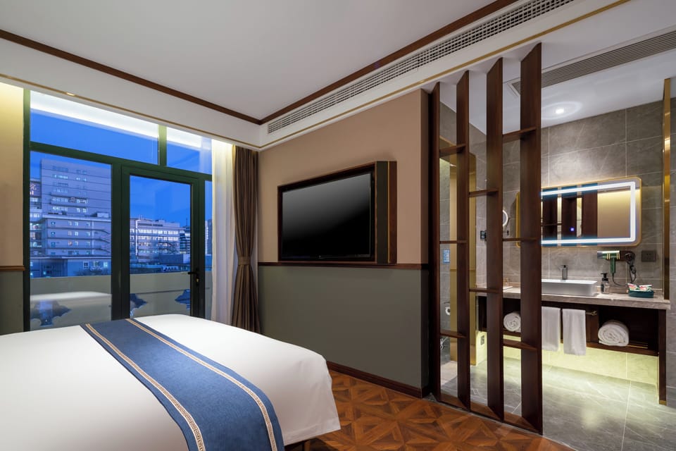 Down comforters, memory foam beds, desk, laptop workspace