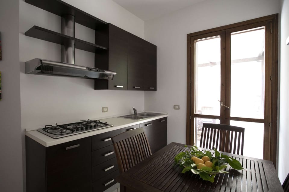 Traditional Villa | Private kitchen | Fridge, oven, stovetop, highchair