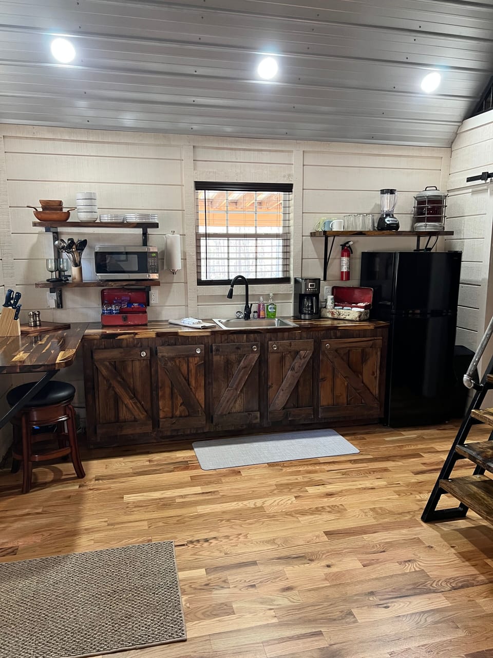View of kitchenette from sofa.
