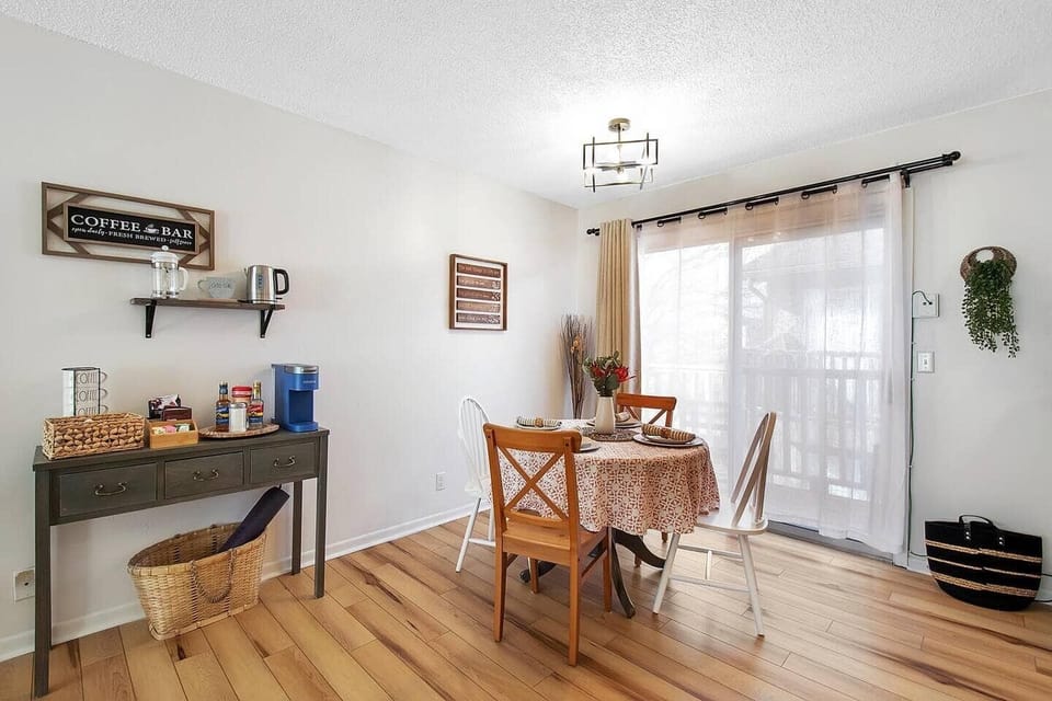 Open Living Room with Workspace, Dining Room, Coffee Bar.