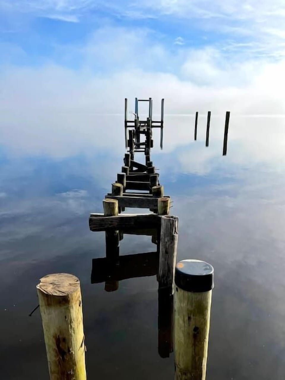 My favorite picture. I took this on a foggy morning just as the sun was breaking thru. This was our Neighbors dock. We have a brand new dock now. 