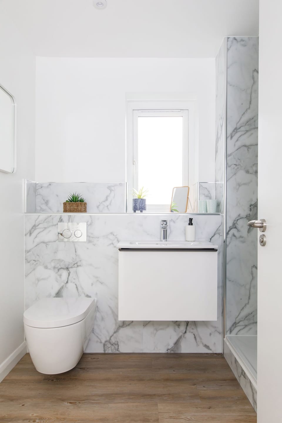 Bathroom toilet, sink and shower 