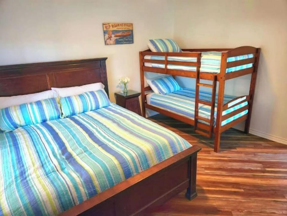 2nd bedroom with King size bed and bunk bed.  Sleeps 4 people easily