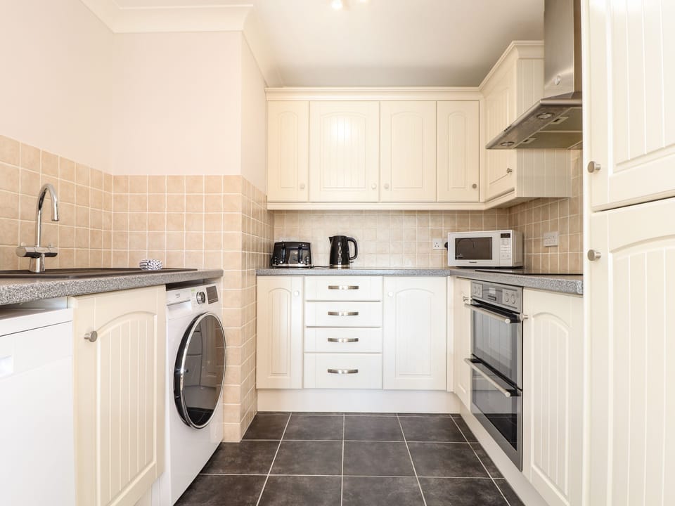 Fridge, dishwasher, cookware/dishes/utensils