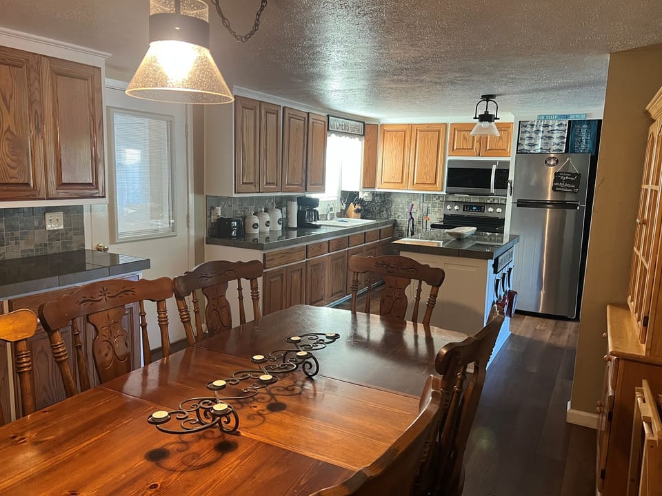 Full Dining Room & stocked Kitchen