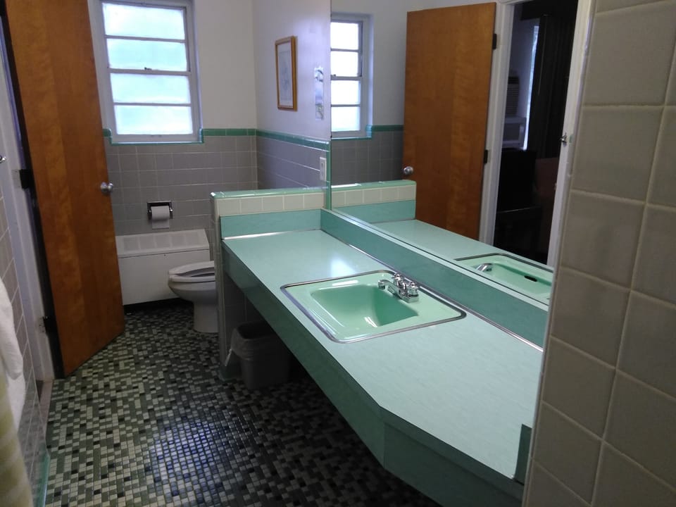 Standard Room, 2 Double Beds | Bathroom sink