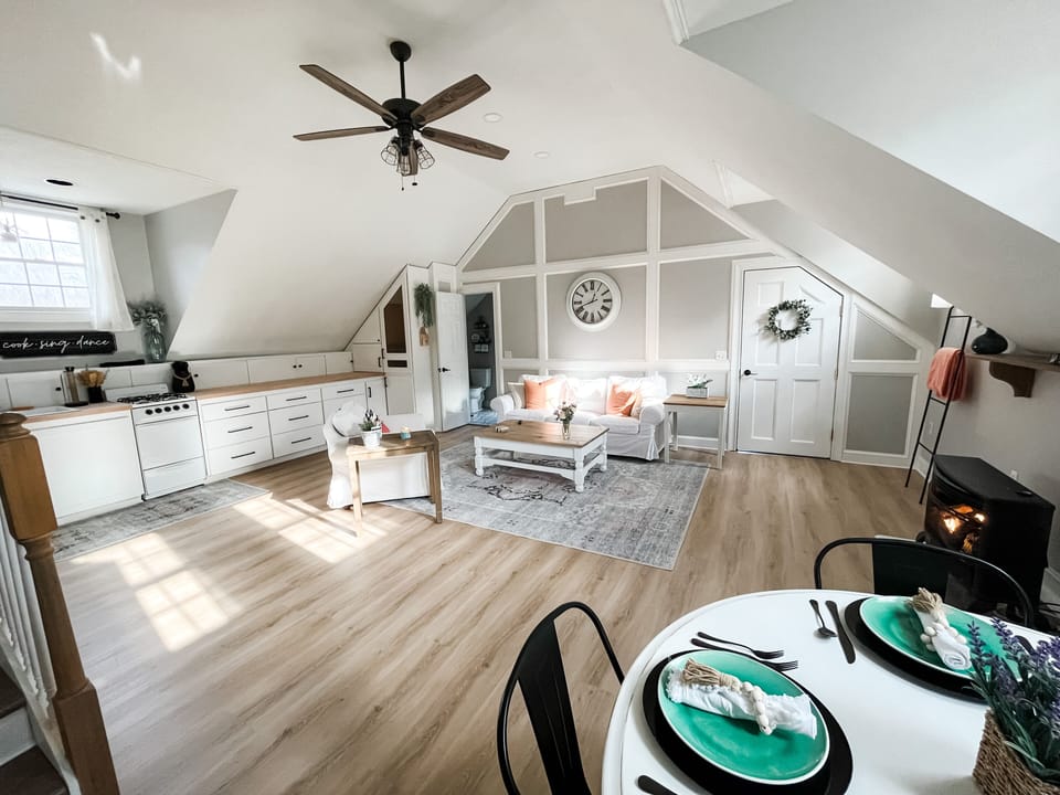 Open concept living room/kitchen/dining area