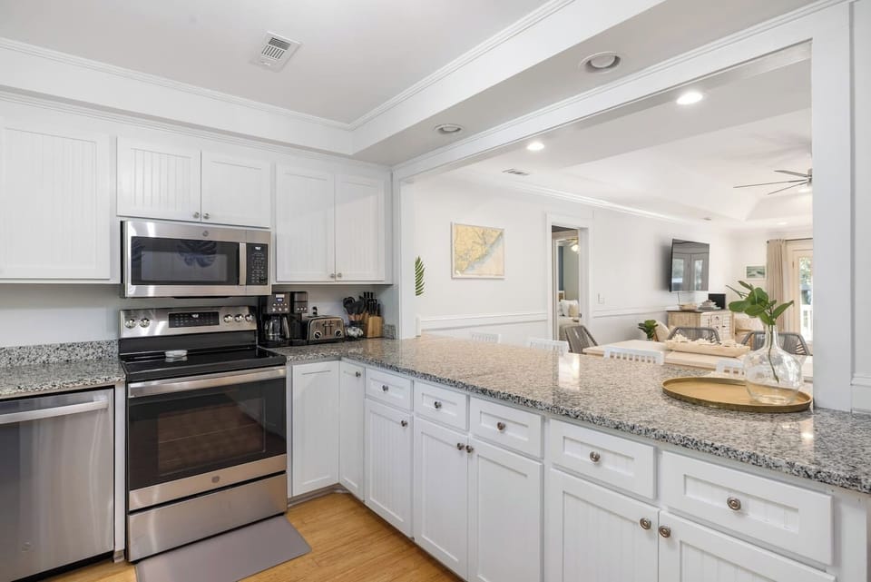 Open concept kitchen with all new appliances in 2023