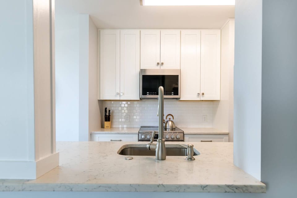 The open design of the kitchen keeps everyone easily accessible.