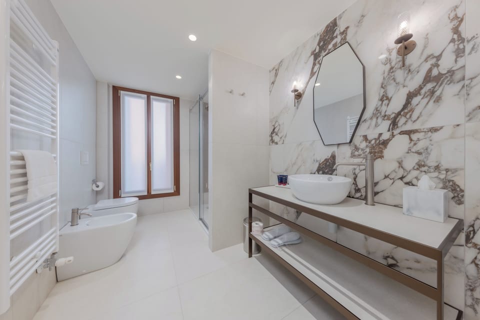 Hair dryer, slippers, bidet, soap