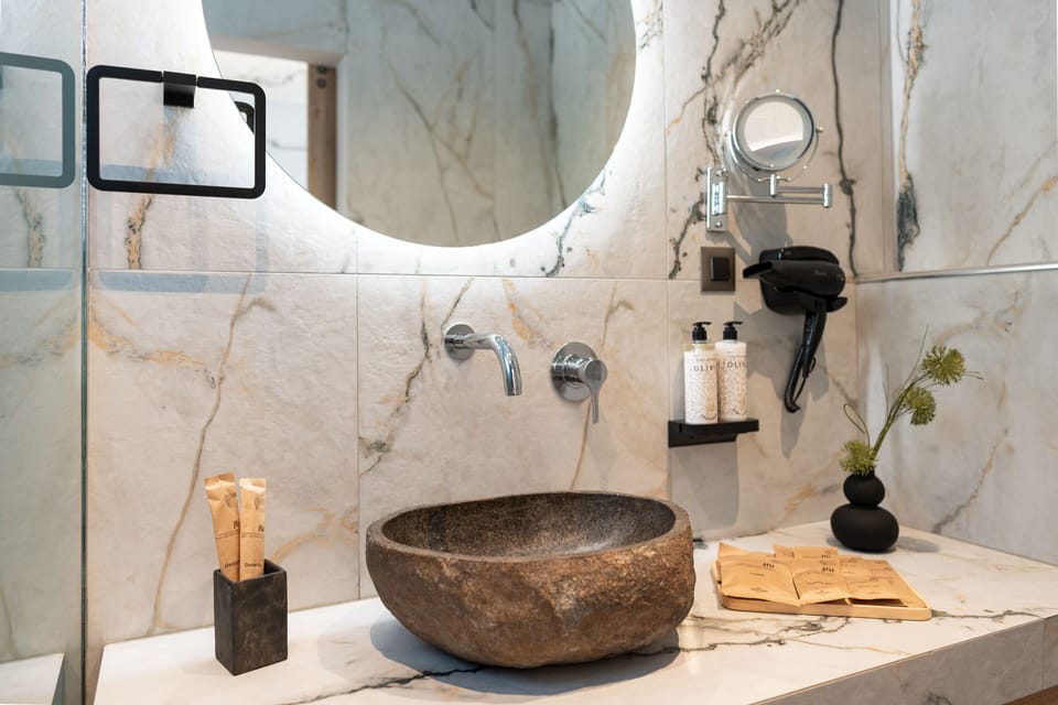 Spring water tub, rainfall showerhead, free toiletries, hair dryer