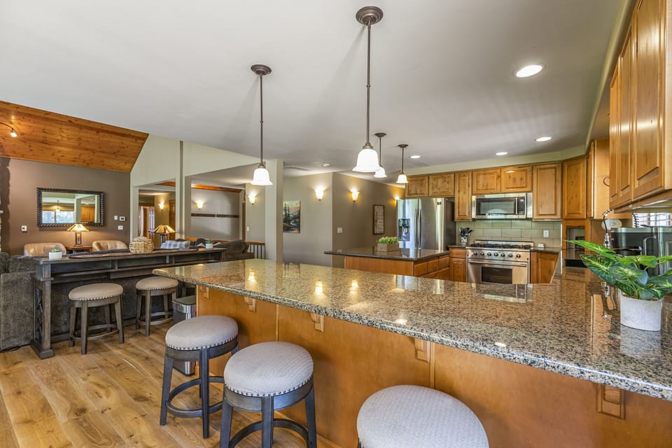 Open concept Floor Plan connects Kitchen, Dining Room, and Great Room - Great for large groups and families