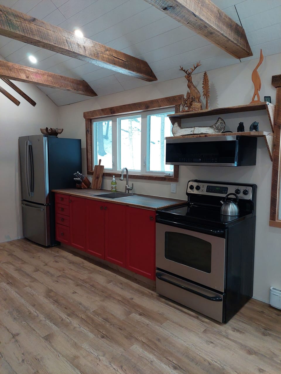 The kitchen is fully equipped with all the conveniences of home.