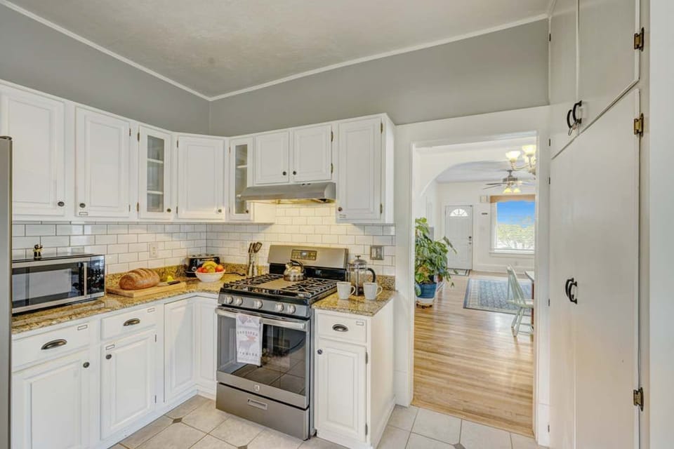 Open layout connecting the kitchen to dining and living areas for easy flow.