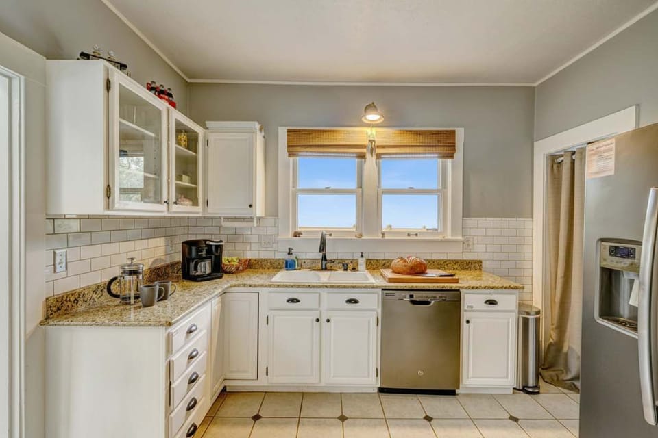 Bright, functional kitchen with all the essentials for cooking and entertaining.