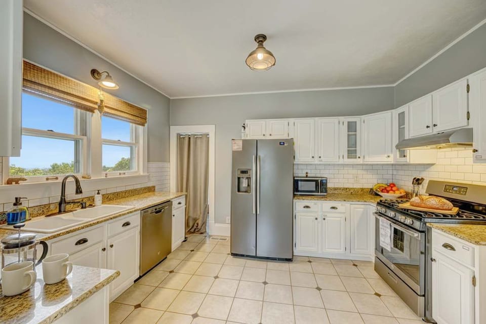 Spacious kitchen with modern appliances and plenty of counter space.