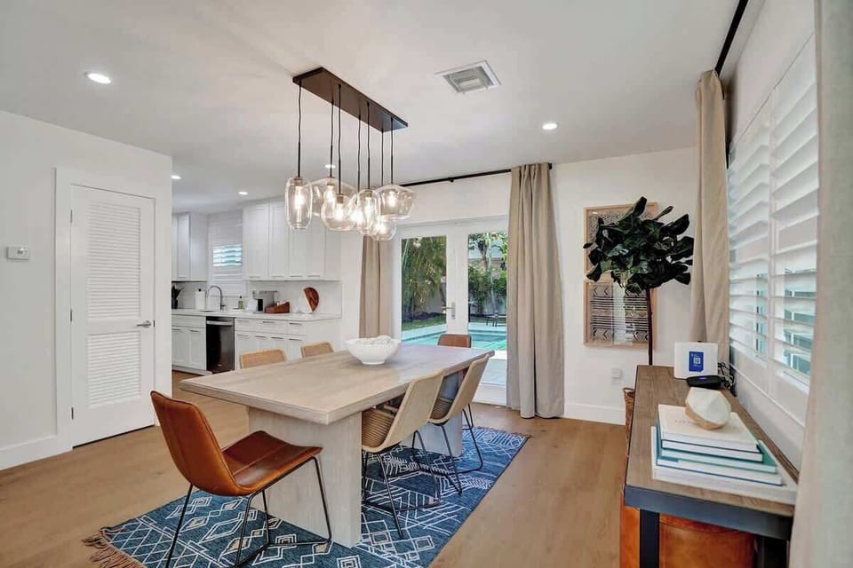 Villa 5 (1/1 unit) Dining room very large and can double as the perfect work-from-home spot (2000Mbps internet!!)
