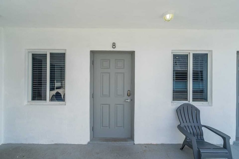 Private unit with easy access and outdoor seating—perfect for guests seeking a quiet, convenient stay.