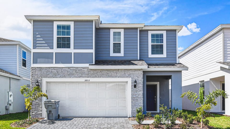 Modern family home near theme parks with spacious layout and stylish exterior.
