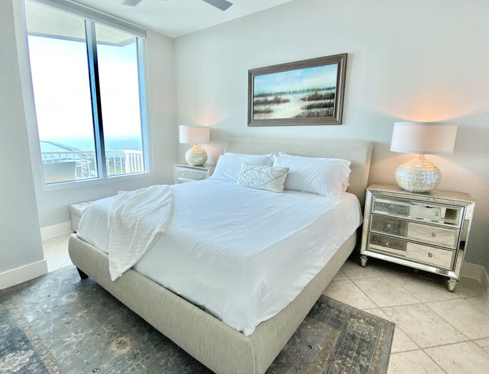 Primary bedroom with bayside view