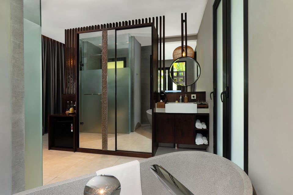 One Bedroom Pool Villa with Plunge Pool | Bathroom | Rainfall showerhead, hair dryer, bathrobes, slippers