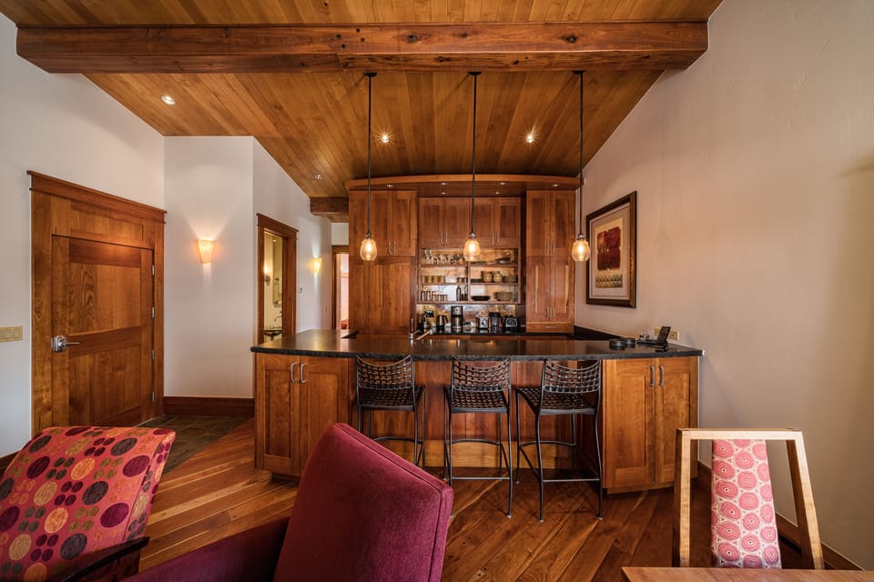 Beautifully designed kitchen and bar seating area. 