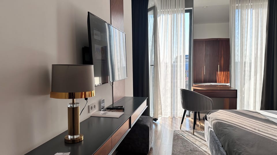 Premium bedding, down comforters, pillowtop beds, minibar