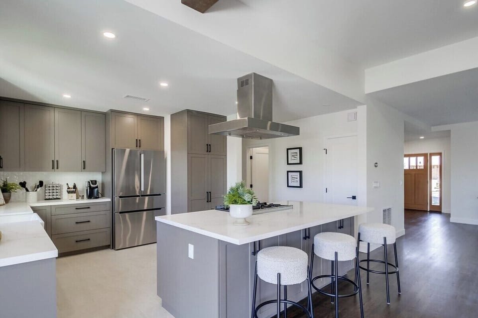 Chef's kitchen with breakfast bar seating