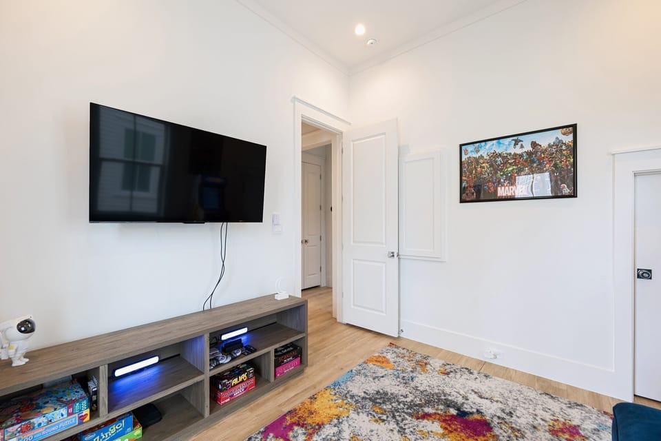 Game Room 50 inch ROKU T.V., Nintendo Video with 2 Controls, Board Games