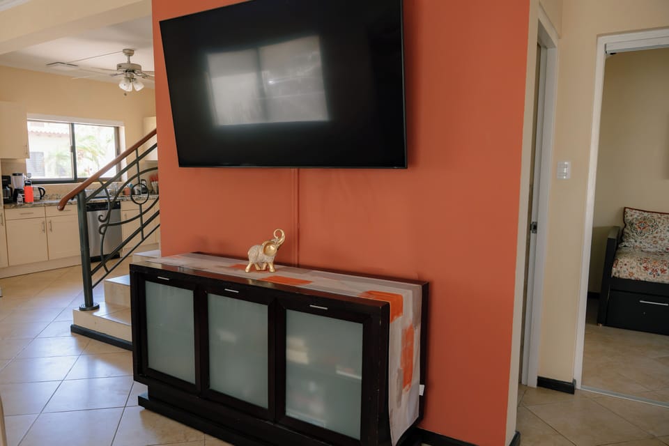 Living room area, television.
Games provided.