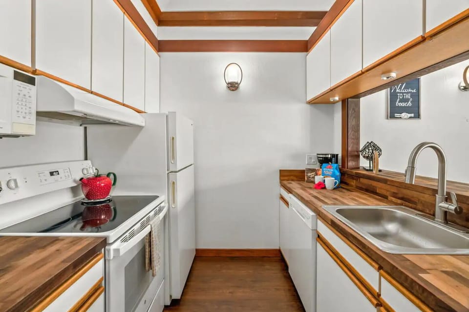 Equipped with a refrigerator, stove, and microwave.